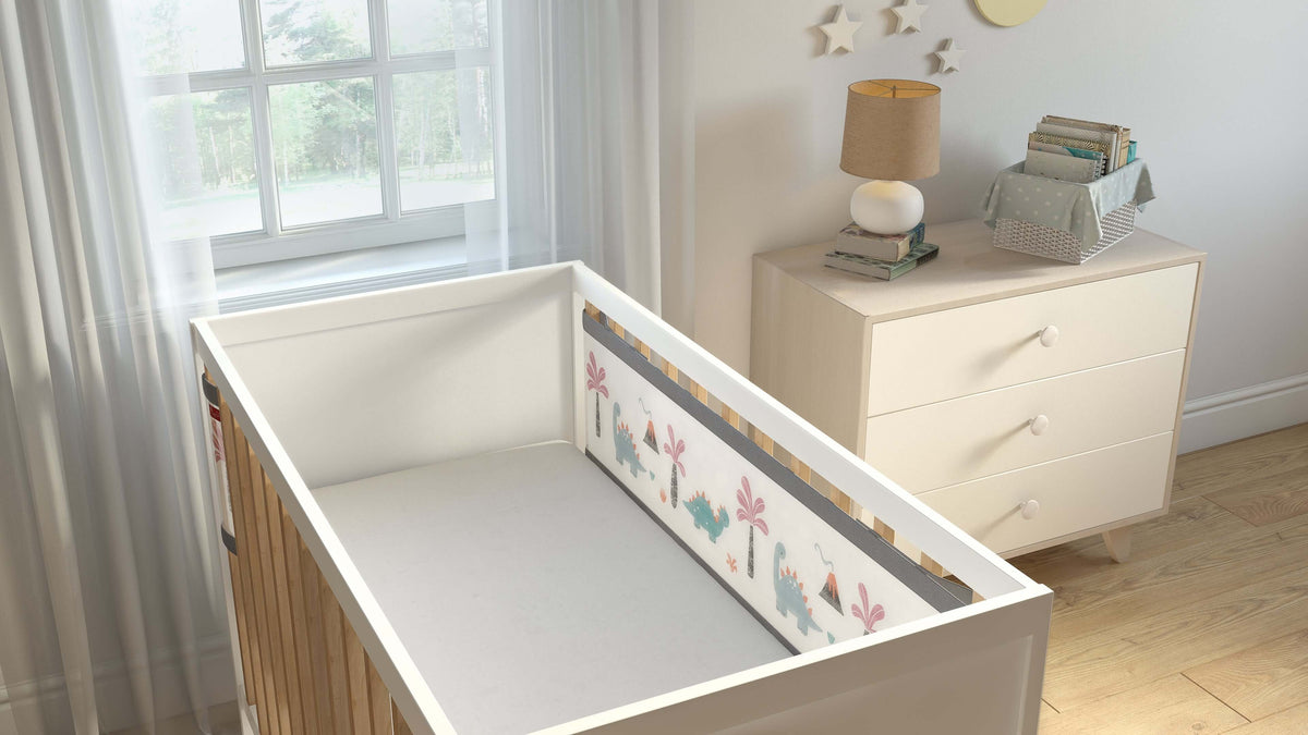 2-sided Breathable Cot bumper with Dinosaur print in nursery room